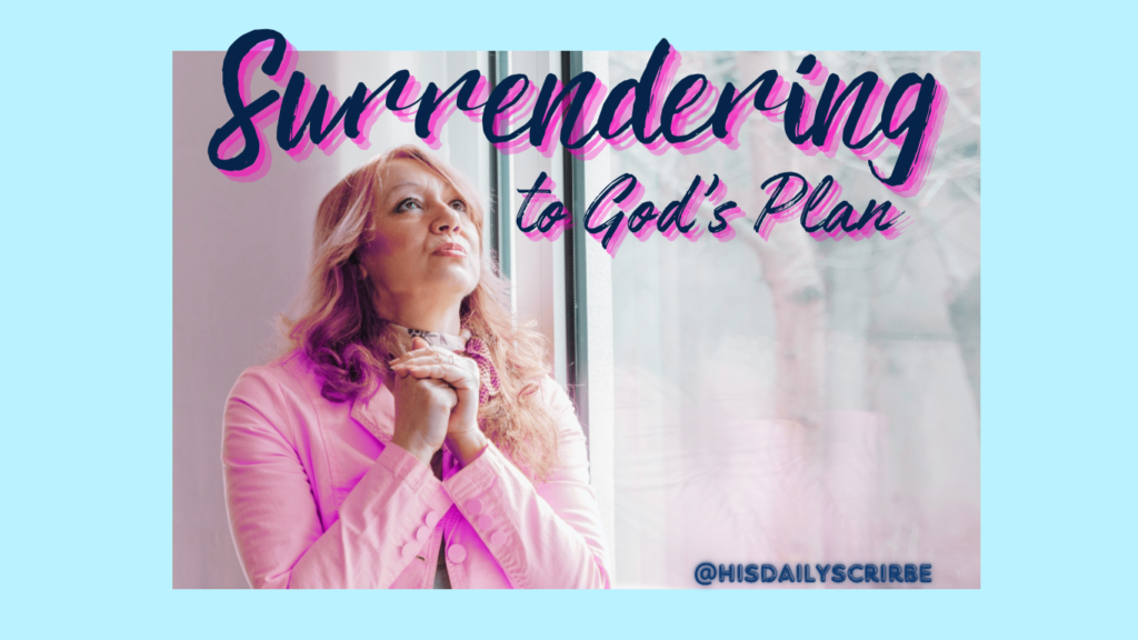 A woman in a pink shirt standing with hands folded looking up toward heaven with part of her reflection showing in the window behind her: Surrendering to God’s plan. 