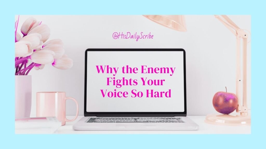 Laptop screen surrounded by flowers and pink decor with bold text “Why the Enemy Fights Your Voice So Hard”