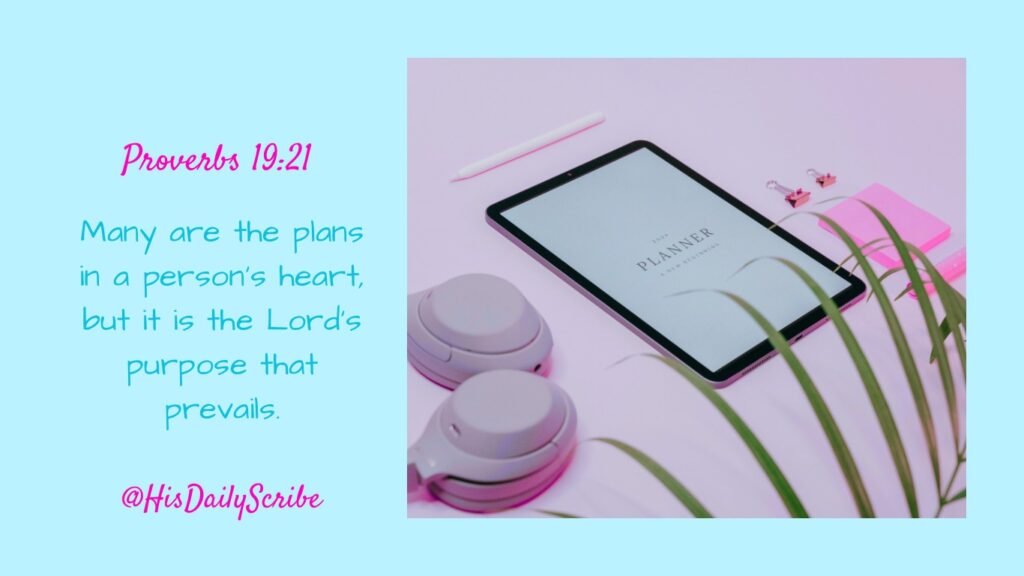 Planner on desk with Bible verse Proverbs 19:21 reminding us that God’s purpose prevails over our plans